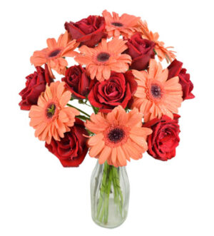 arrangement of roses and daisies in a vase