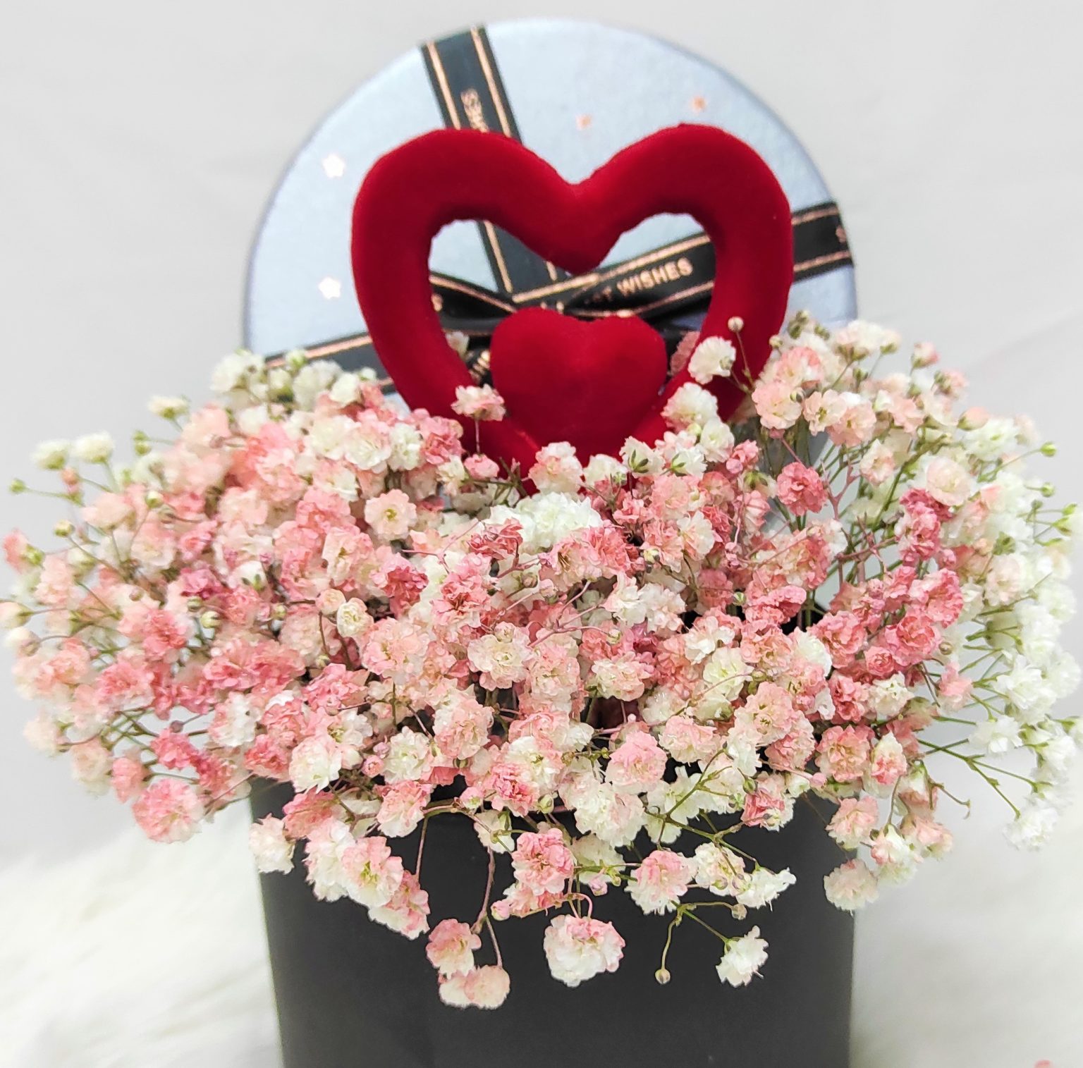 PInk baby breath arranged in a box - Blooming Florist