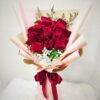 Red roses hand bouquet