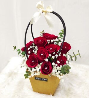red roses with diamond pin