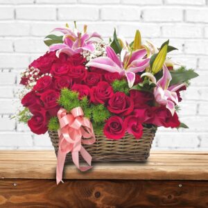 roses lilies in basket arrangement