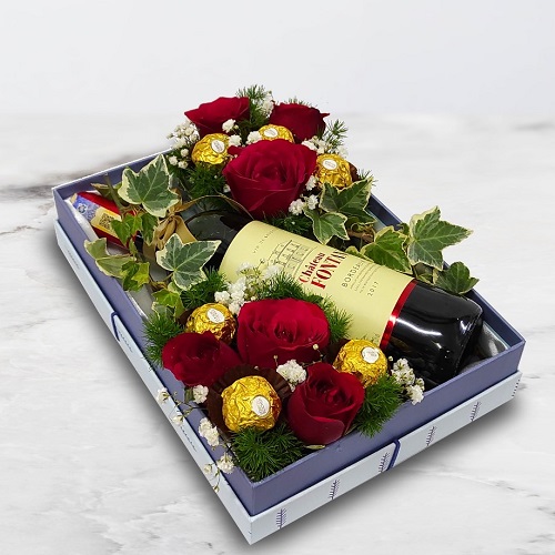 sparkling juice wine chocolate and flower box arrangement