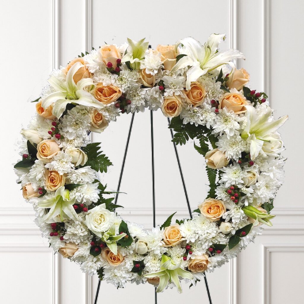 simple cheap wreath stands for graves        
        <figure class=