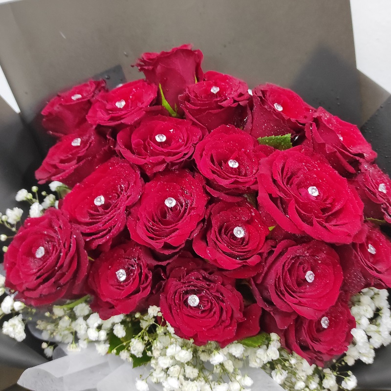 red roses bouquet in black