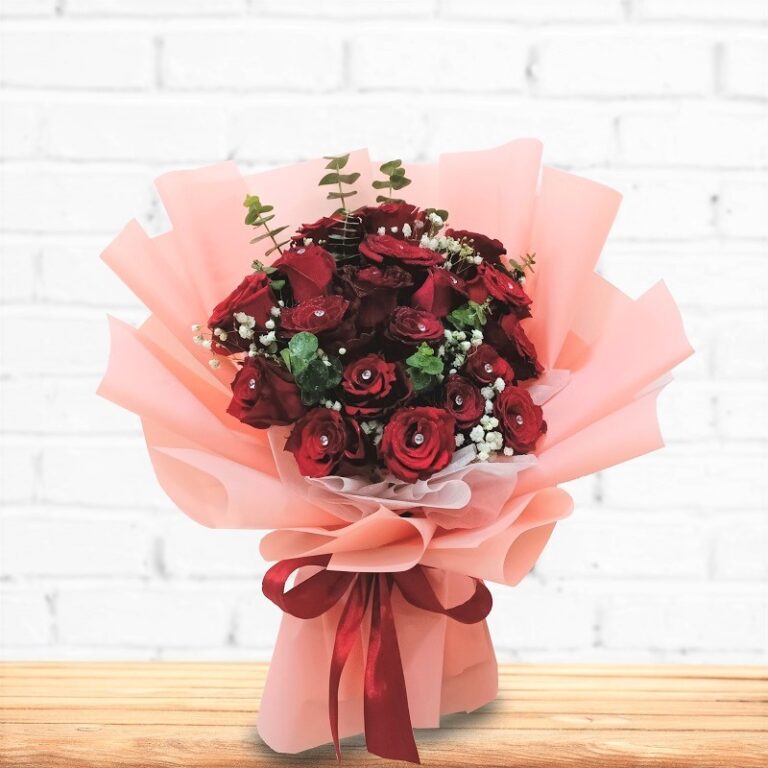 premium-red-roses-valentine-s-hand-bouquet-in-pink-blooming-florist