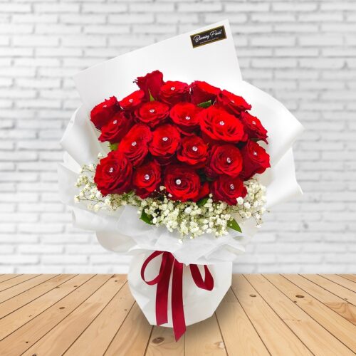 red roses bouquet in white