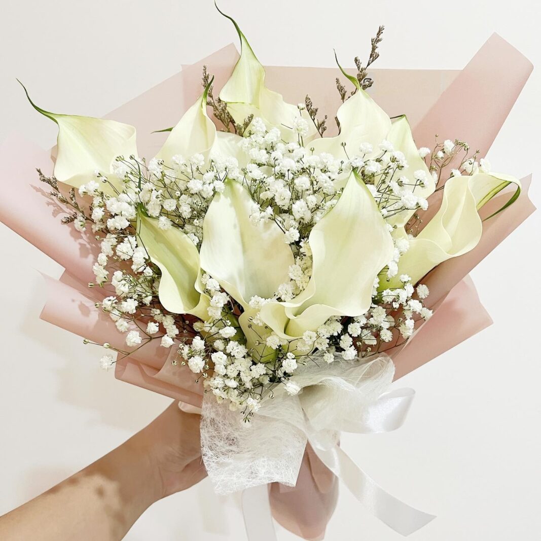 Order champagne roses & lilies hand bouquet - Blooming Florist