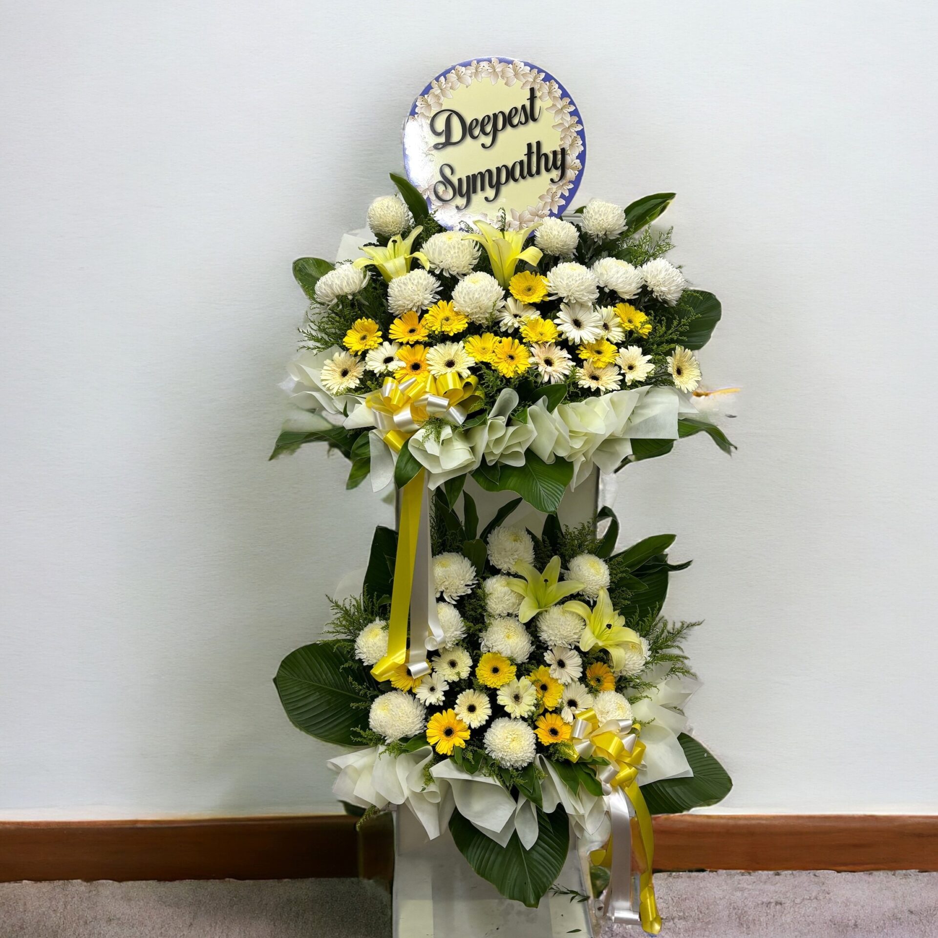 Sending lilies condolence funeral wreath delivery - Blooming